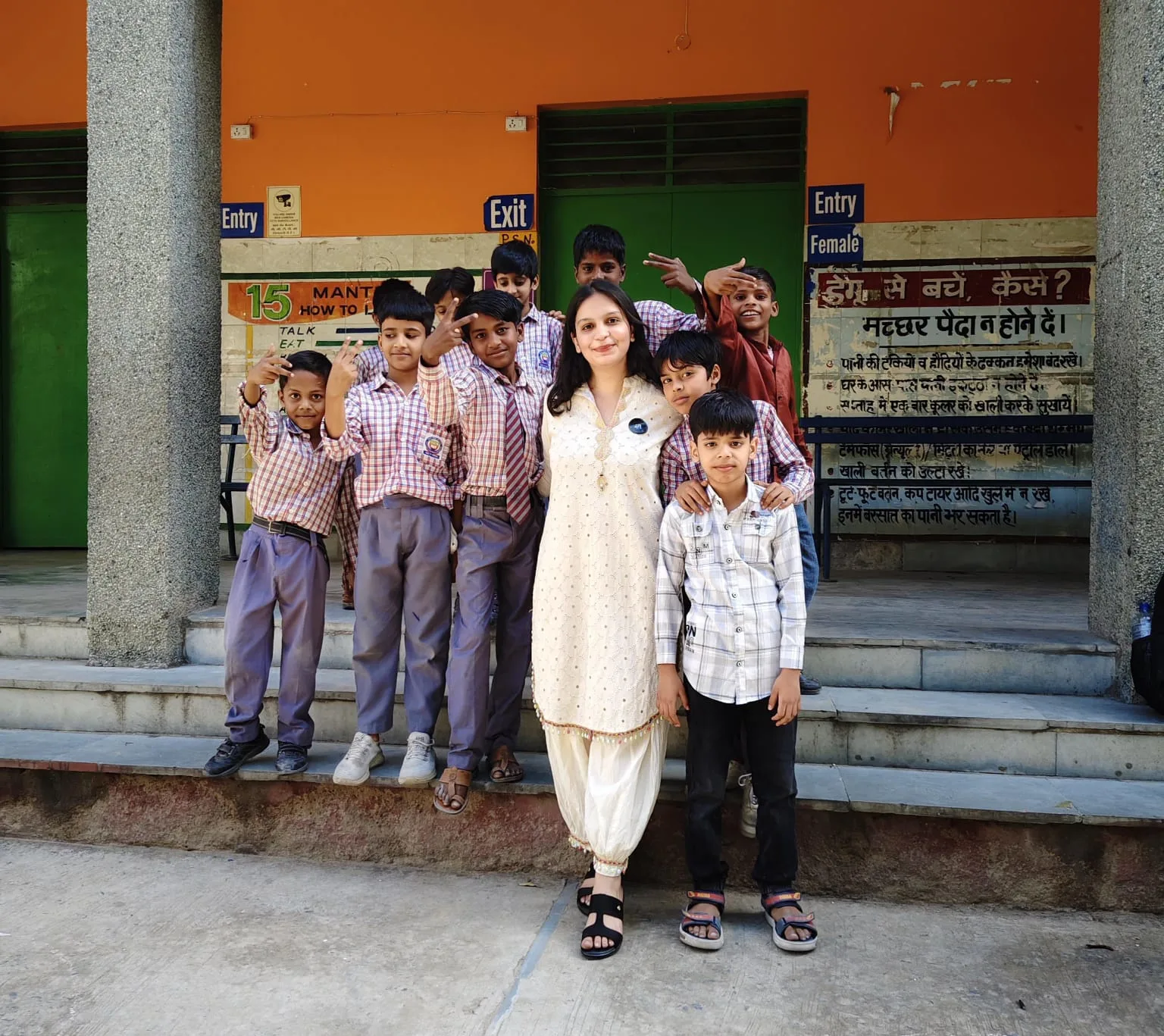 Children giving high-five and smiling together